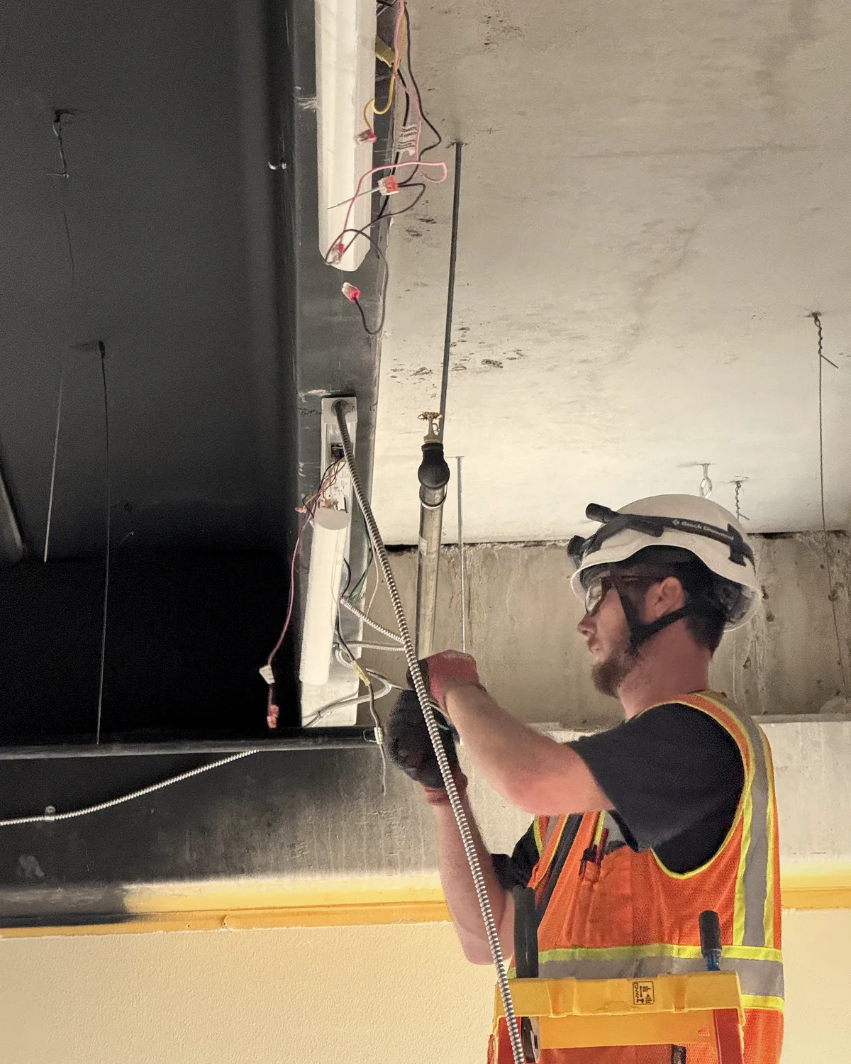 Colpitts Electric electrician completing an installation on a commercial project