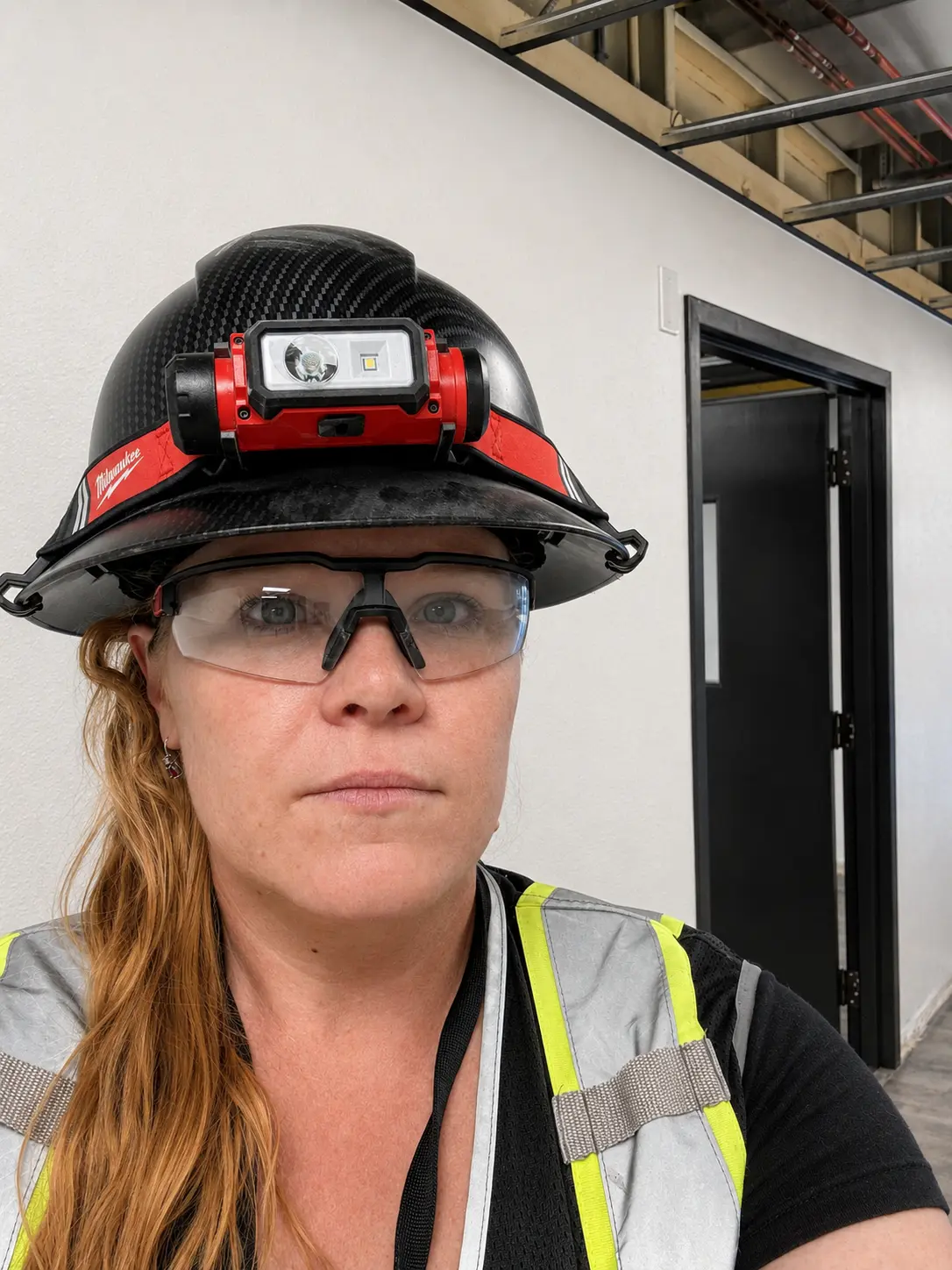 Melissa Colpitts, Master Electrician and owner, on a commercial jobsite